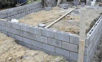 Professionals building a foundation with blocks in Jersey City, NJ