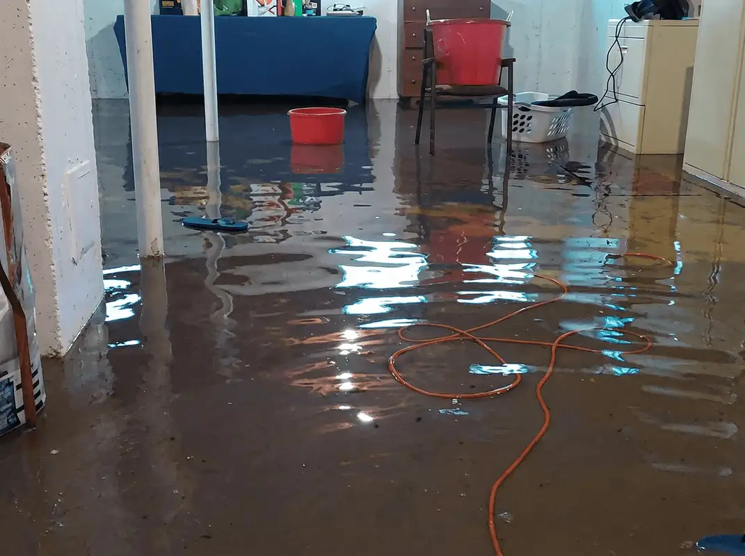 Basement with boiler, cabinets and washing machine completely flooded in Jersey City, NJ